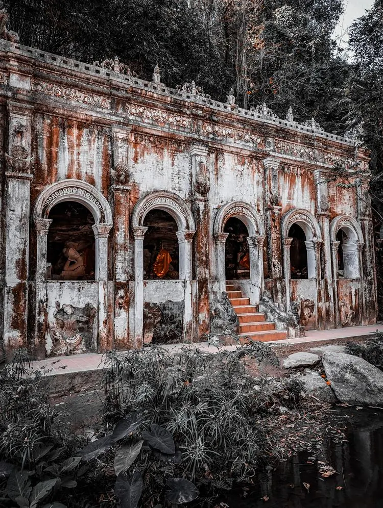 An ornate weathered historic building in Chiang Mai